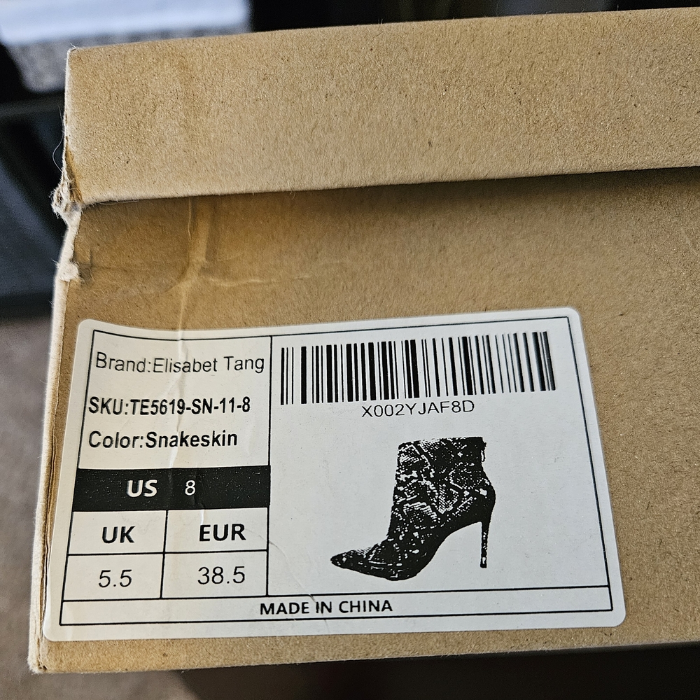 Elisabet Tang Snakeskin Heeled Boots
